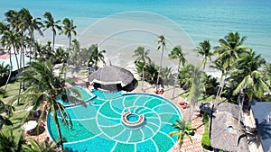 Aerial view of Swimming pool and the beach in the resort