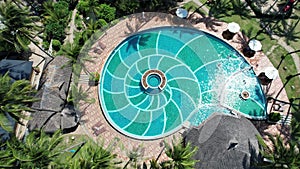 Aerial view of Swimming pool and the beach in the resort