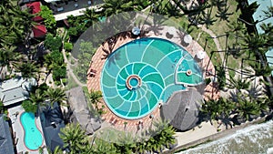 Aerial view of Swimming pool and the beach in the resort