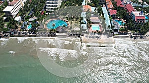 Aerial view of Swimming pool and the beach in the resort