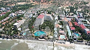 Aerial view of Swimming pool and the beach in the resort