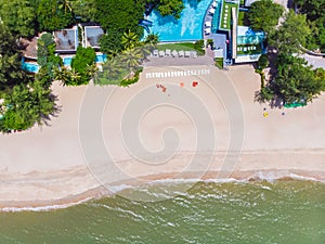 Aerial view of swimming pool with sea and beach