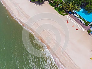 Aerial view of swimming pool with sea and beach