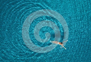 Aerial view of swimming woman in mediterranean sea