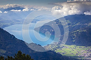 Aerial view of Swiss Alps and Lake Thun at dramatic sunset, Interlaken