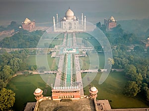 Aerial view of Taj Mahal in Agra India covered with morning fog