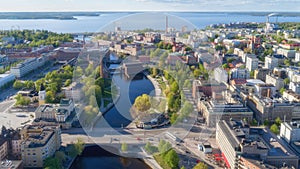 Aerial view of Tampere city center. Beautiful river and green trees