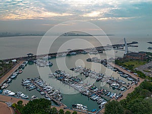 Aerial view of Tamsui Fisherman's Wharf. Overview of Love Bridge and boats in Tamsui, New Taipei City, Taiwan