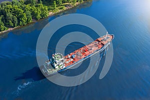 Aerial view tanker ship with liquid bulk cargo is sailing in channel water