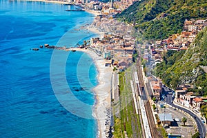 Aerial view of Taormina-Giardini station and Giardini Naxos, comune in Messina on Sicily Island, Italy