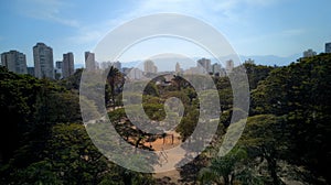 Aerial view of Taubate from Santa Terezinha square, with the mantiqueira mountain range in the background, on a sunny