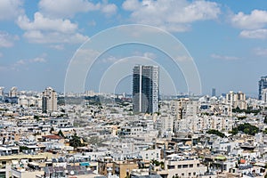 Aerial view of Tel Aviv City with modern skylines and luxury hotels against blue sky at the beach near the Tel Aviv port in Israel