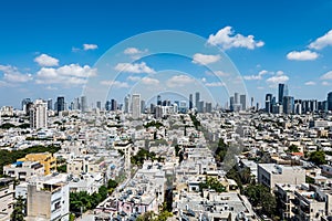 Aerial view of Tel Aviv City with modern skylines and luxury hotels against blue sky at the beach near the Tel Aviv port in Israel