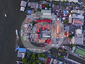 Aerial view of temple, Wat Devaraj Kunchorn Worawihan, Thai architectures. Close up of red roofs. Top view