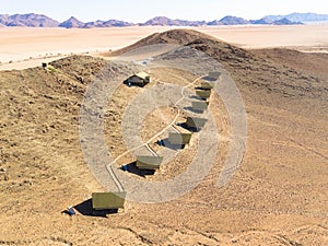 Aerial view: Tents with view of Tiras mounains,  Namibia Africa