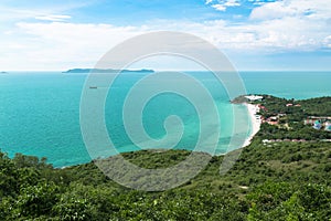 Aerial view from Thailand Koh Larn overlooking the community and the beaches with the sea during the day time amide the blue sk