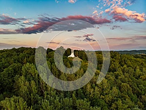 Aerial view of the Three Crosses monument overlooking Vilnius Old Town on sunset. Vilnius landscape from the Hill of Three Crosses
