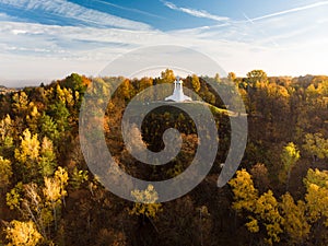 Aerial view of the Three Crosses monument overlooking Vilnius Old Town on sunset. Vilnius landscape from the Hill of Three Crosses