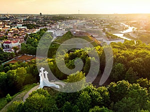 Aerial view of the Three Crosses monument overlooking Vilnius Old Town on sunset. Vilnius landscape from the Hill of Three Crosses