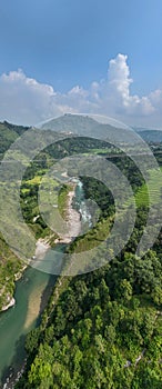 Aerial view of a Tibetan suspended bridge in Nepal. Wild nature