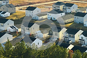 Aerial view of tightly packed homes in South Carolina residential area. New family houses as example of real estate