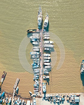 Aerial view of tiny vessels in the port