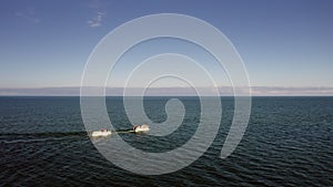 Aerial view to the Baltic sea.Two fishing boats are sailing in the sea.