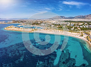 Aerial view to the beach of Glyfada with yacht marinas and turquoise sea, Greece photo