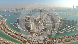 Aerial view to city from the Palm Jumeirah island in Dubai, UAE