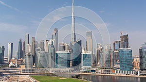 Aerial view to Dubai Business Bay and Downtown with the various skyscrapers and towers timelapse