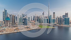 Aerial view to Dubai Business Bay and Downtown with the various skyscrapers and towers timelapse