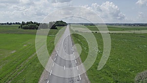 Aerial view to almost empty road