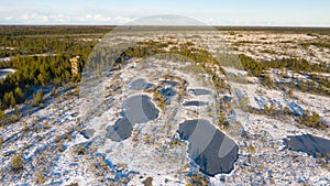 Aerial view to the Estonian peat bog scenery with the fresh snow and ice photo
