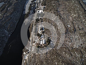 Aerial view to filling in the winter covered with snow.