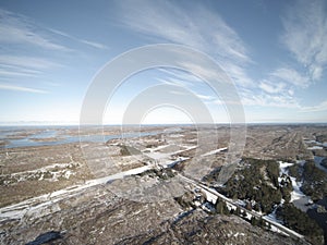 Aerial view to filling in the winter covered with snow.