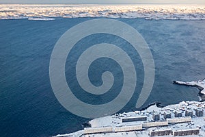 Aerial view to the fjord, Inuit houses and snow street of Greenlandic capital Nuuk city, Greenland