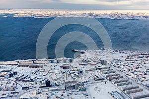 Aerial view to the fjord and snow streets of Greenlandic capital Nuuk city, Greenland photo