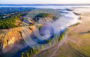 Aerial view to foggy valley with river Siverskyi Donets