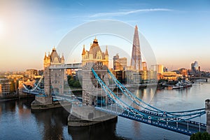 Aerial view to the iconic Tower Bridge and skyline of London, UK