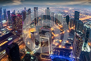 Aerial view to the illuminated city center of Doha, Qatar photo