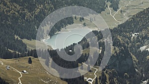 Aerial view to the mountain lake Seealpsee at the alpstein massif