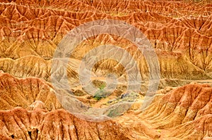 Aerial view to orange red sand formation of Tatacoa desert photo