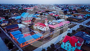 Aerial View to the Porvenir city under the Sunset Lights