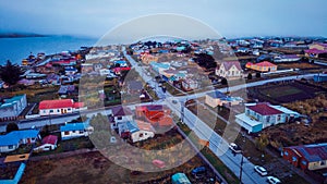 Aerial View to the Porvenir city under the Sunset Lights