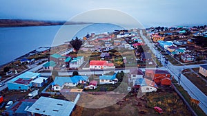 Aerial View to the Porvenir city under the Sunset Lights