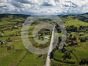 Aerial view to road with moutains captured from above