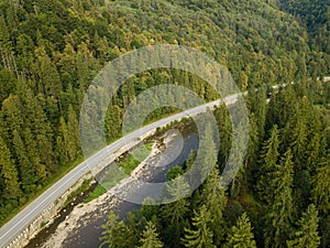 Aerial view to road with moutains captured from above