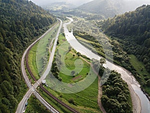 Aerial view to road with moutains captured from above