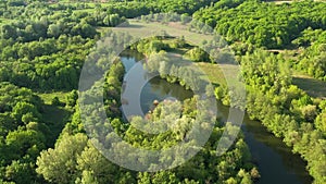 Aerial view to spring forest with river Seversky Donets