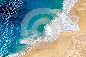 Aerial view to tropical sandy beach and blue ocean
